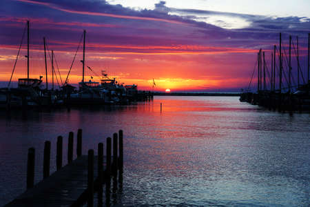 Image of a beautiful sunset at boat marina           の写真素材