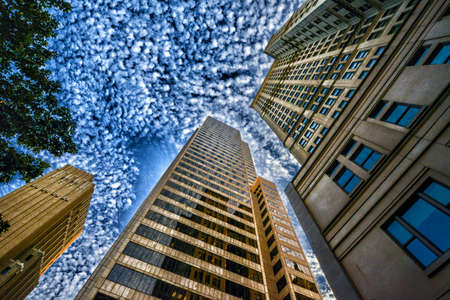 Image looking up at buildings downtown in HDRの写真素材