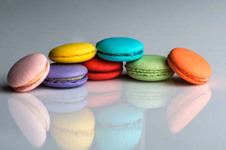Assorted colors of macaroons on neutral backgroundの写真素材