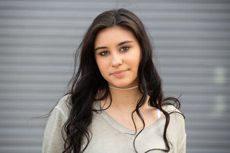 Image of gorgeous brunette girl smiling into the cameraの写真素材