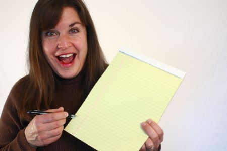 Woman holding notepadの写真素材