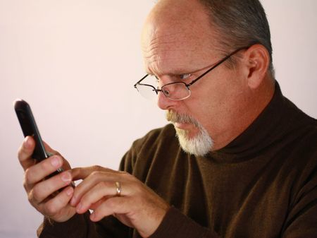 Man looking at cell phone