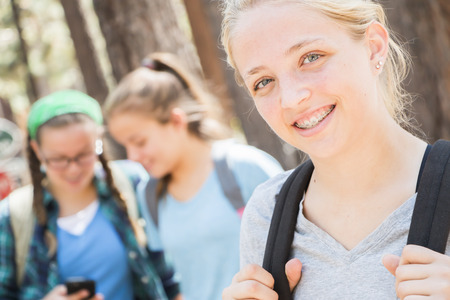 Three Young Girl Friends together at the Parkの写真素材