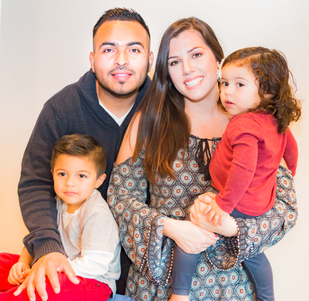 Beautiful Portrait of Happy Hispanic Familyの写真素材