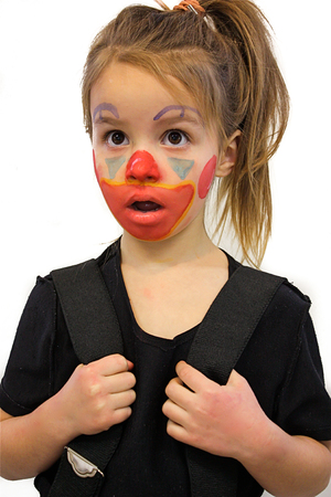 Beautiful Little Girl With Clown Makeupの写真素材