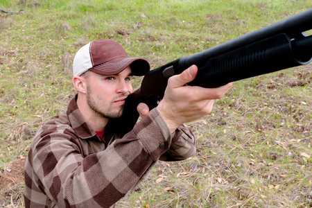 Young Man Hunting With Shotgun