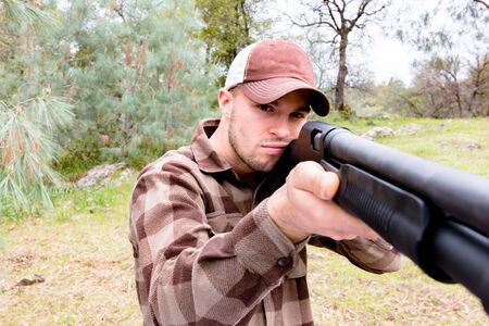 Young Man Hunting With Shotgun