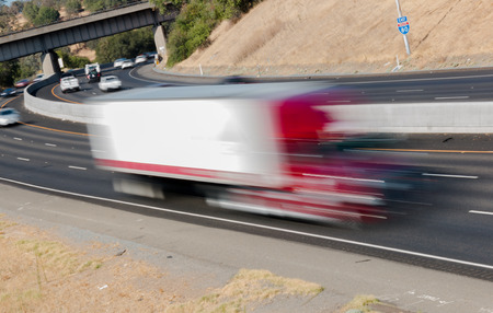 Many Vehicles in Motion on Three Lane Highwayの写真素材