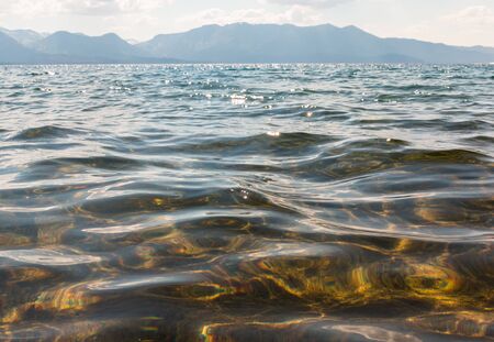 Waves of Water and Splashes on the Lake Shorelineの写真素材