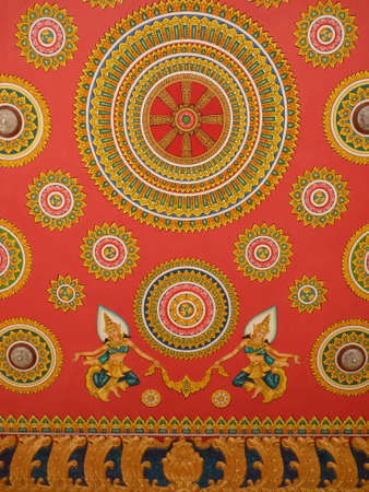 Lao art on Pha That Luang temple wall, Vientiane, Laosの写真素材