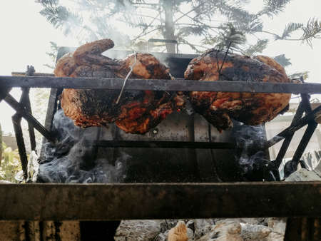 grilled chickens well roasted on a grill peruの写真素材