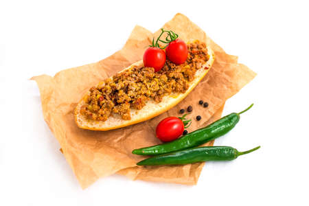 Sandwich with minced meat mexican style with vegetables isolated on whiteの写真素材