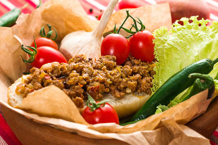 Sandwich with minced meat mexican style with vegetablesの写真素材