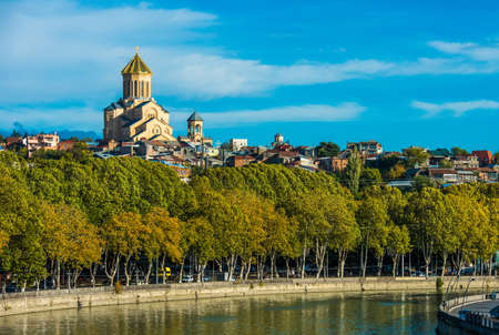 View of Sameba church and Kura river in Tbilisi, Georgia