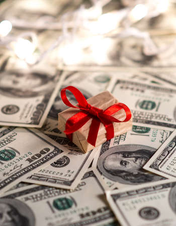 Gift box and US dollar billsの写真素材