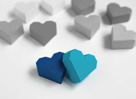 Paper hearts on white background