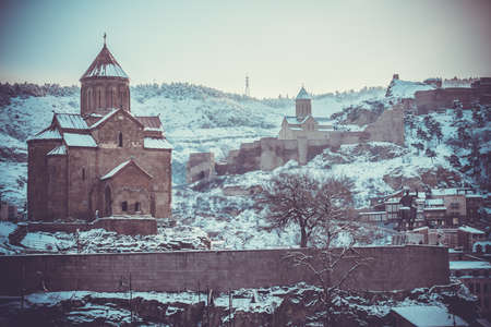 Virgin Mary Metekhi church, Narikala Fortress and Vakhtang I Gorgasali statue in Tbilisi, Georgiaの写真素材