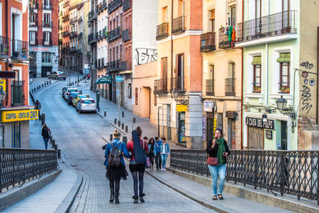 MADRID, SPAIN - MARCH 12: Old street with few pedestrians in March 12, 2014 in Madrid, Spain. It is old centre of capital cityのeditorial素材