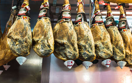 MADRID, SPAIN - MARCH 12: Jamon market in March 12, 2014 in Madrid, Spain. Jamon (Spanish word for ham) traditional meat in spanish cuisine.のeditorial素材