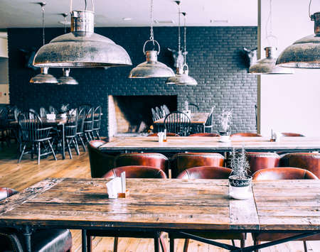 Interior of modern restaurant. Picture toned in retro styleのeditorial素材