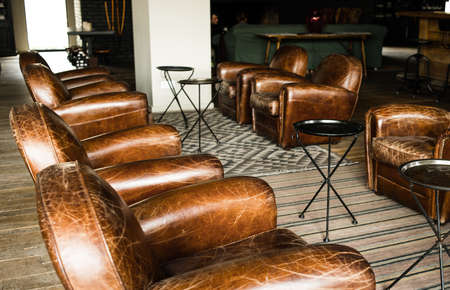 Classic brown leather armchairs in lobbyのeditorial素材