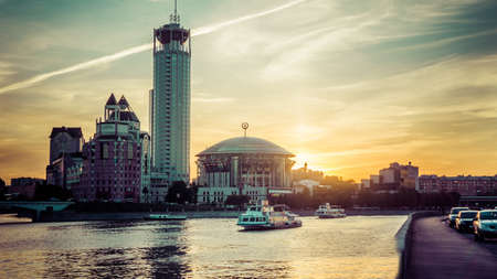 Modern buildings and Moskva river at sunset in Moscow, Russia. Toned pictureのeditorial素材