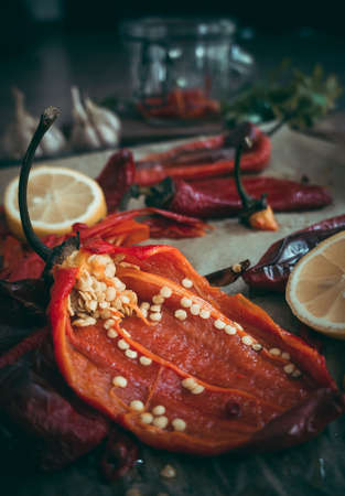Owen-baked red paprika peppers with garlic and olive oil. Toned pictureの写真素材