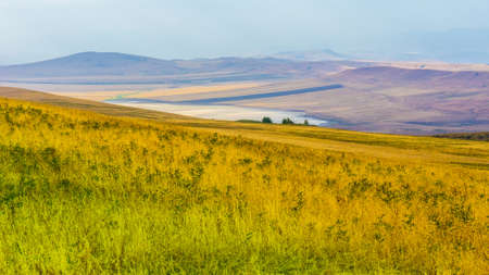Fields and mountains in Georgia, Caucasus. Toned picture