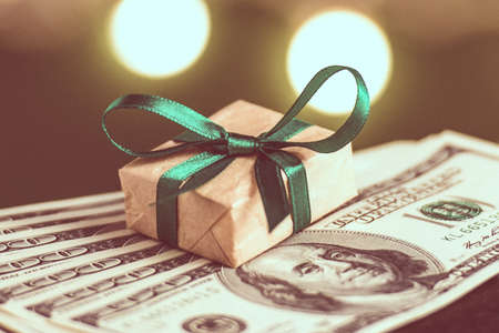 Gift box and US dollar bills. Toned pictureの写真素材