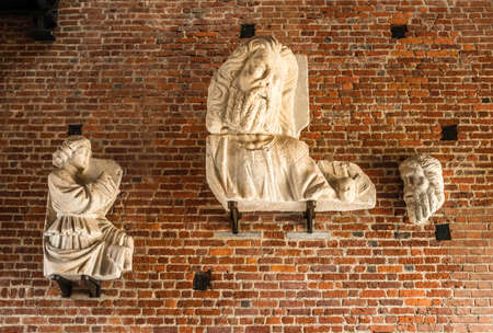 Old sculptures inside the Castello Sforzesco in Milan, Italyのeditorial素材