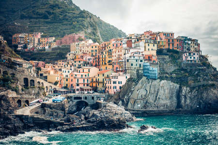 Manarola is one of five famous colorful villages of Cinque Terre in Italyの写真素材