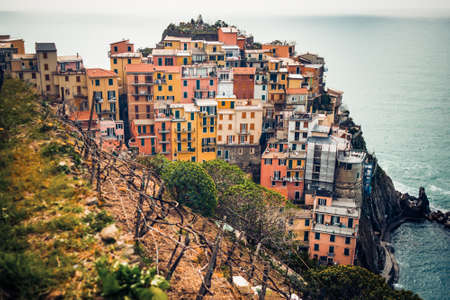 Manarola is one of five famous colorful villages of Cinque Terre in Italyの写真素材