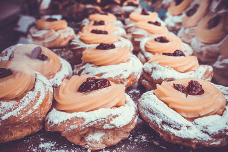 Typical neapolitan pastry Zeppola. Toned imageの写真素材