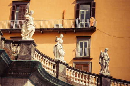 Statues on the building of Convitto Nazionale Vittorio Emanuele in Napoli, Italyの写真素材