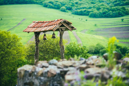 Church bells in Dmanisi - medieval town with its citadel, public and religious buildingsの写真素材