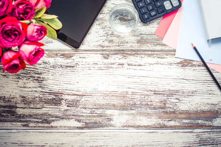 Empty space on business wooden table  with office supplies. Top view. Perfect for product montage.の写真素材