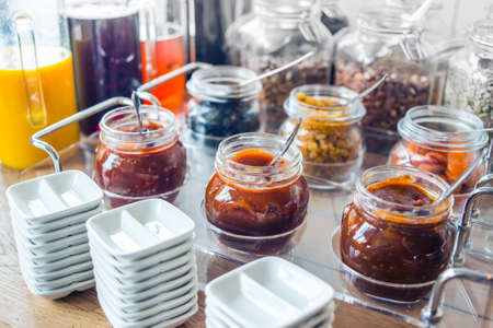 Glass jars with homemade jamの写真素材