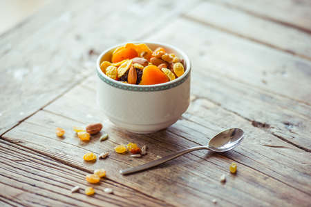 Healthy cereals breakfast on wooden tableの写真素材