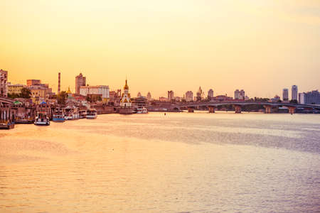View on the Drepr (Dnieper) river and cityscape at evening in Kiev, Ukraineの写真素材