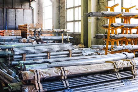 MOSCOW, RUSSIA - CIRCA MAY, 2011: Stacked aluminum rods in russian smelting plant Alfa-Metal, based in Moscow, Russiaのeditorial素材