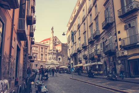 NAPLES, ITALY - MARCH 20, 2015: Classical romantic small street in the historical center of Naples, Italy. Toned pictureのeditorial素材