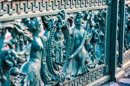 Old cast-iron bridge decoration in Saint Petersburg, Russiaの写真素材