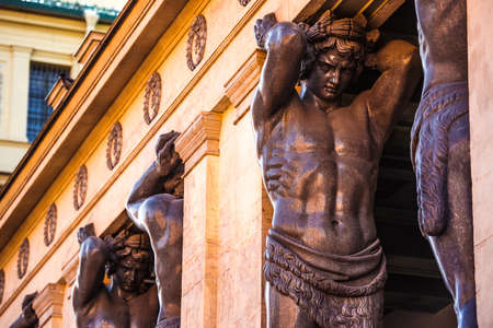 Granite telamons as a detail of facade decoration of  Hermitage museum in Saint Petersburg, Russiaのeditorial素材