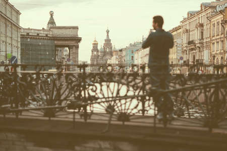 Bank Bridge (Bankovsky most) and The Church of the Savior on Spilled Blood on background in Saint Petersburg, Russia. Toned pictureの写真素材
