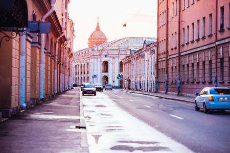 Street with old beautiful buildings in historical center during summer white nights in Saint Petersburg, Russia. Toned pictureの写真素材