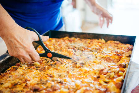 Preparing homemade pizza in Italyの写真素材