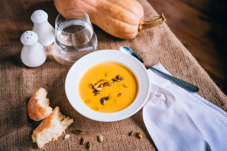 Roasted pumpkin and carrot soup and pumpkin seedsの写真素材