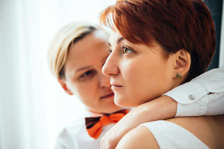 Close up of a beautiful lesbian couple. Gay marriage concept.の写真素材