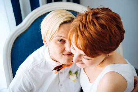 Close up of a beautiful lesbian couple. Gay marriage concept.の写真素材
