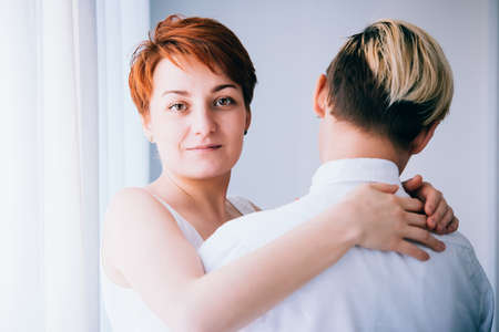 Close up of a beautiful lesbian couple. Gay marriage concept. Toned pictureの写真素材